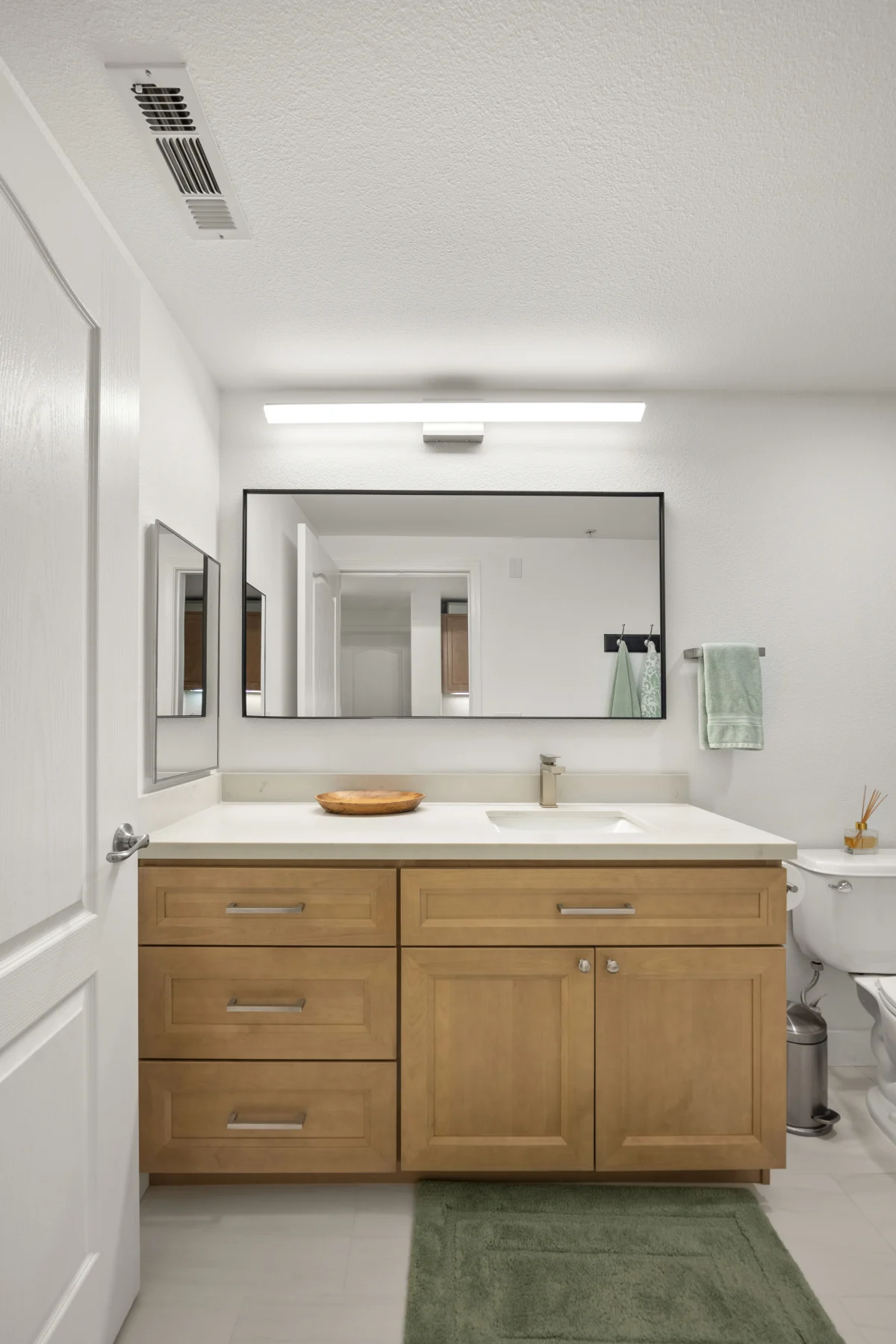 Two Bathroom Remodel with Natural Finishes, photo 29