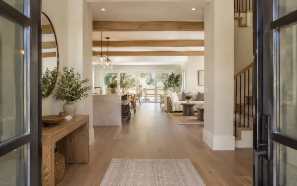 Welcoming entry looking toward an open kitchen and living room